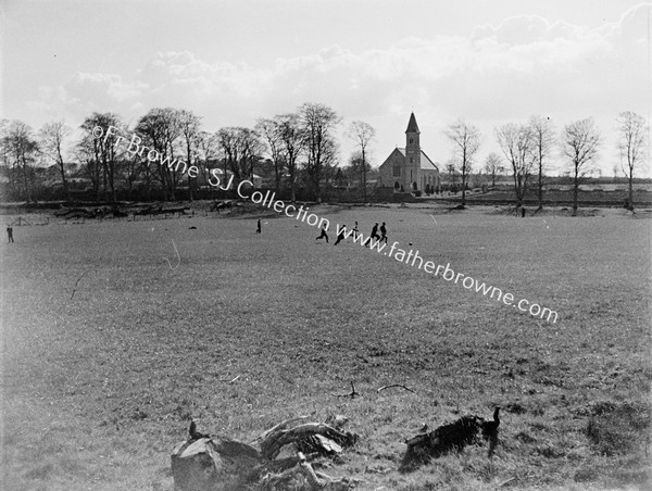 SPORTS DAY RUNNERS WITH R.C. CHURCH IN BACKGROUND